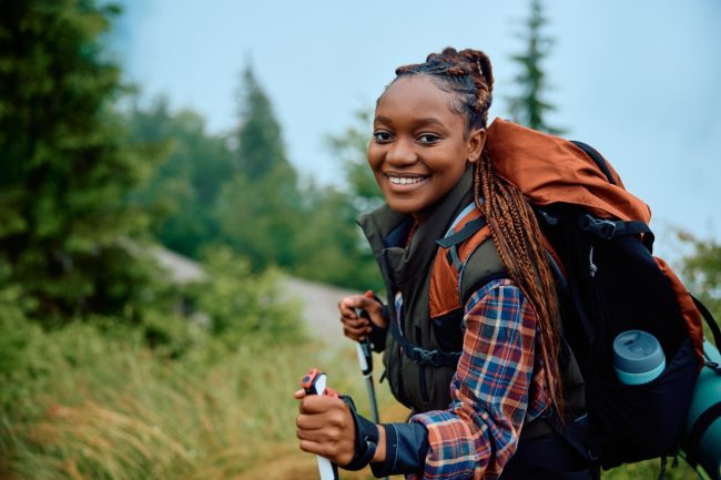 AdobeStock_622448026 Hiker on a hill by Drazen resize