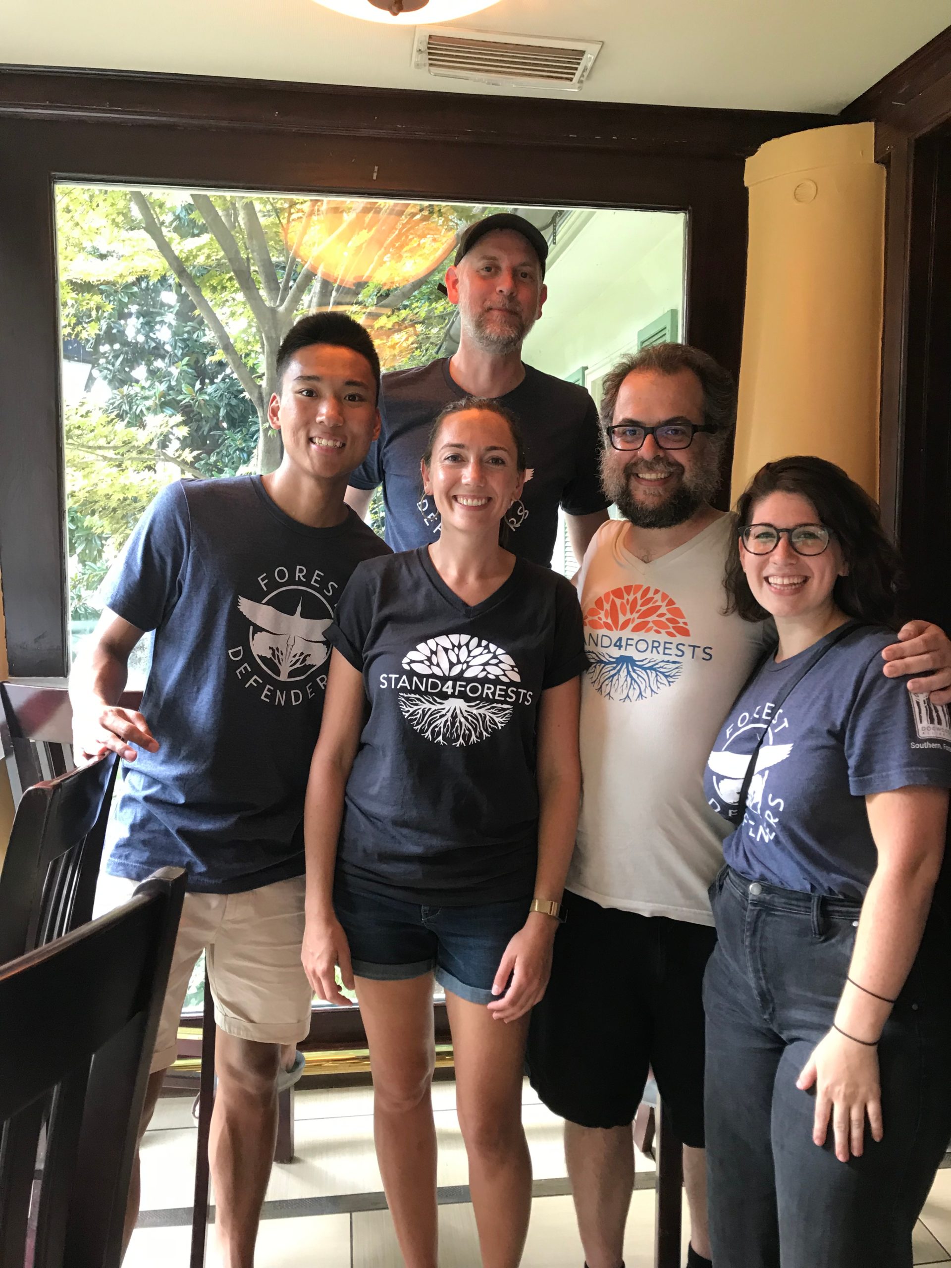 5 Dogwood staff/interns smile for a photo wearing their Forest Defender and Stand4Forests tee-shirts