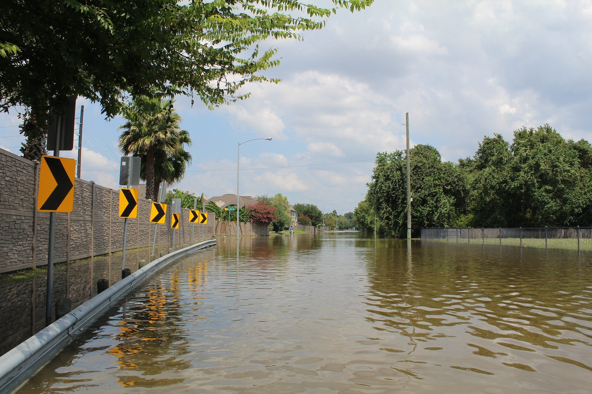 hurricanes: a flooded roadway, the aftermath of hurricane harvey