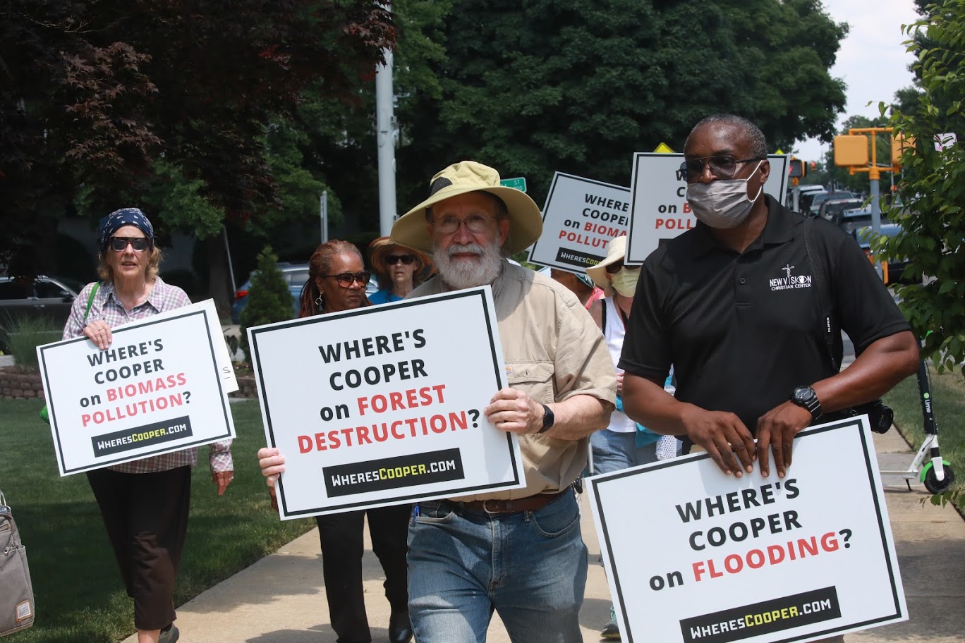 demonstrators march where is governor cooper